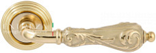 Дверная ручка Extreza "GRETA" (Грета) 302 на розетке R05 полированная латунь F01